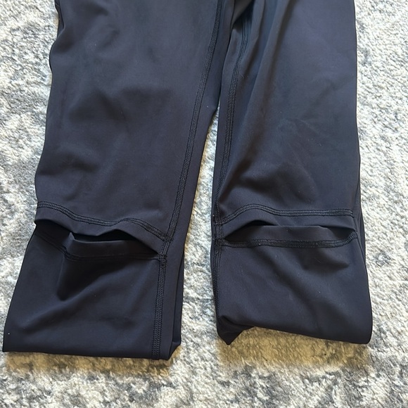 Lululemon size 6 black leggings with knee slits/cut outs - Picture 2 of 3